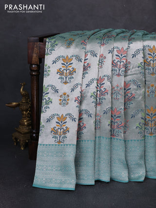 Banarasi raw silk saree teal green with allover silver zari woven paithani weaves and zari woven border