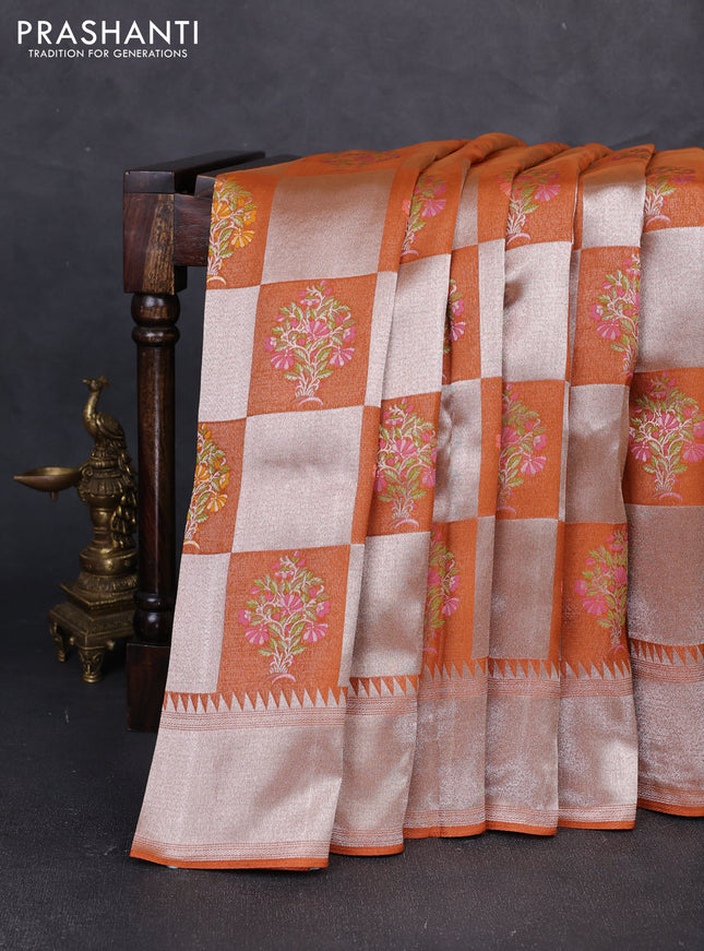 Banarasi raw silk saree rust shade with allover silver zari weaves & paithani buttas and zari woven border