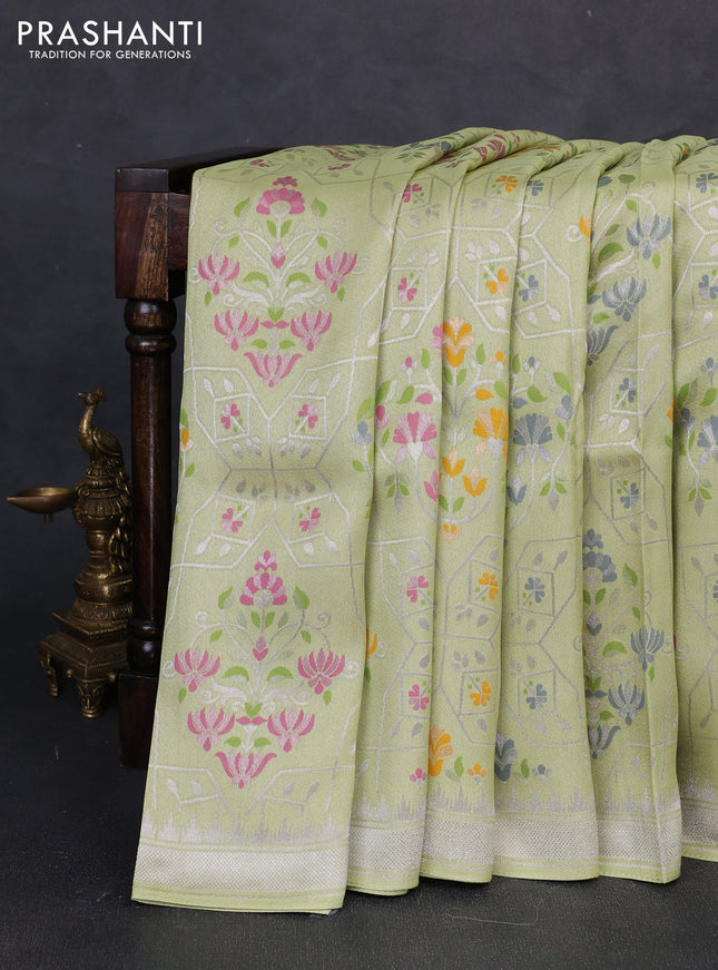 Banarasi raw silk saree light green with allover silver zari woven paithani weaves and zari woven border