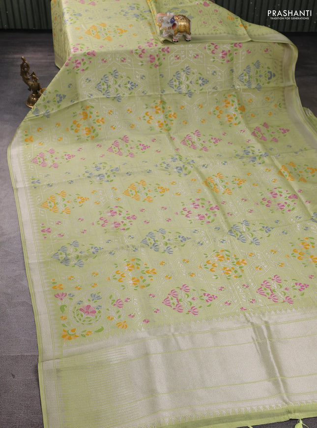 Banarasi raw silk saree light green with allover silver zari woven paithani weaves and zari woven border
