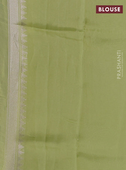 Banarasi raw silk saree light green with allover silver zari woven paithani weaves and zari woven border