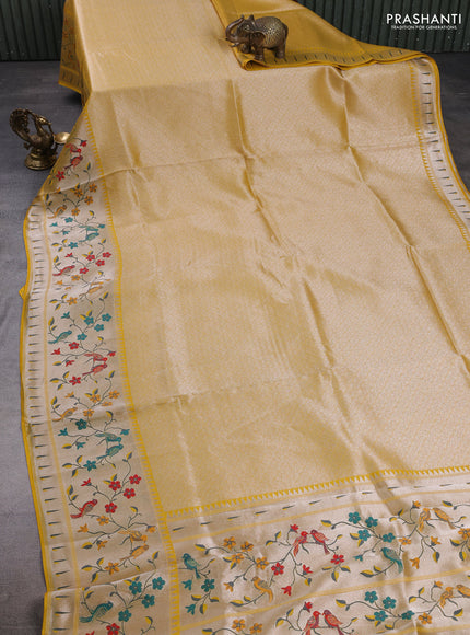 Banarasi raw silk saree mustard yellow with allover silver zari woven brocade weaves and paithani style border