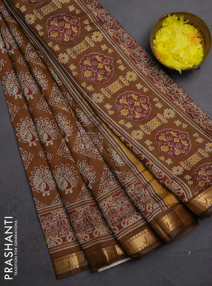 Semi maheshwari cotton saree dark mustard with allover ajrakh prints and zari woven muniya style border