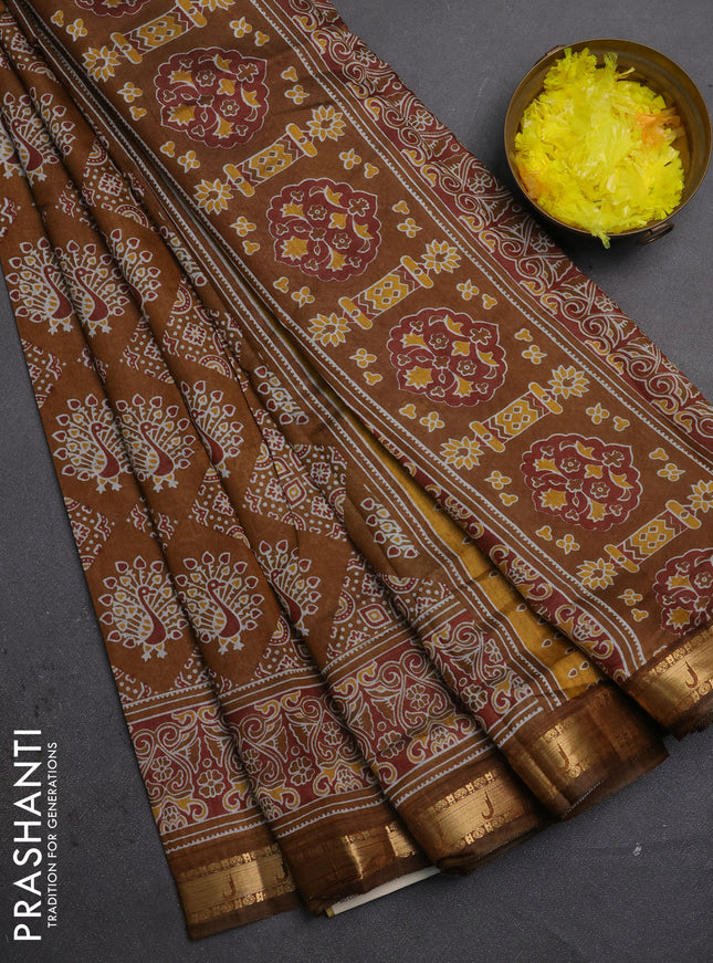 Semi maheshwari cotton saree dark mustard with allover ajrakh prints and zari woven muniya style border