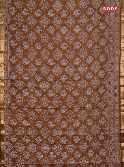 Semi maheshwari cotton saree dark mustard with allover ajrakh prints and zari woven muniya style border