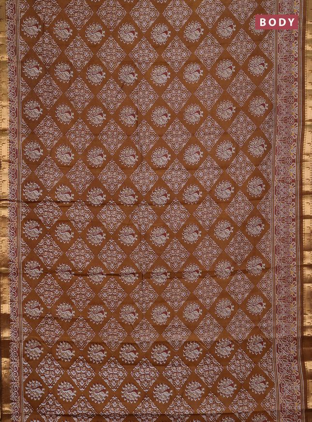 Semi maheshwari cotton saree dark mustard with allover ajrakh prints and zari woven muniya style border