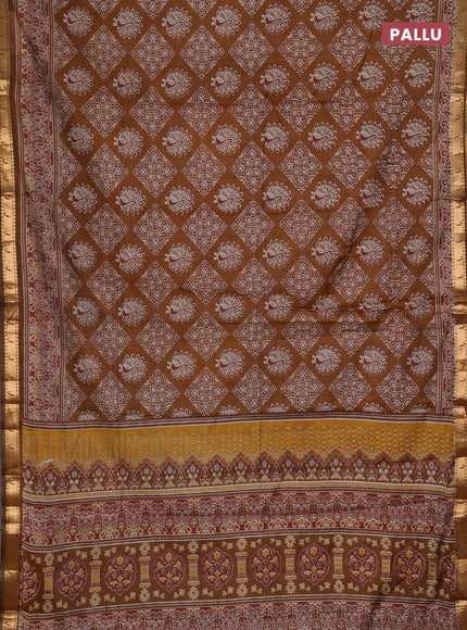 Semi maheshwari cotton saree dark mustard with allover ajrakh prints and zari woven muniya style border