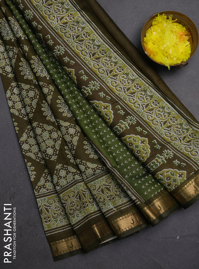 Semi maheshwari cotton saree olive green with allover ajrakh prints and zari woven muniya style border