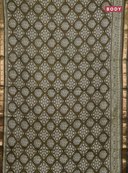 Semi maheshwari cotton saree olive green with allover ajrakh prints and zari woven muniya style border