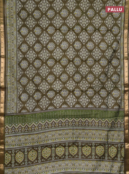 Semi maheshwari cotton saree olive green with allover ajrakh prints and zari woven muniya style border