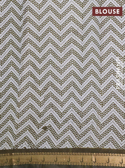Semi maheshwari cotton saree olive green with allover ajrakh prints and zari woven muniya style border