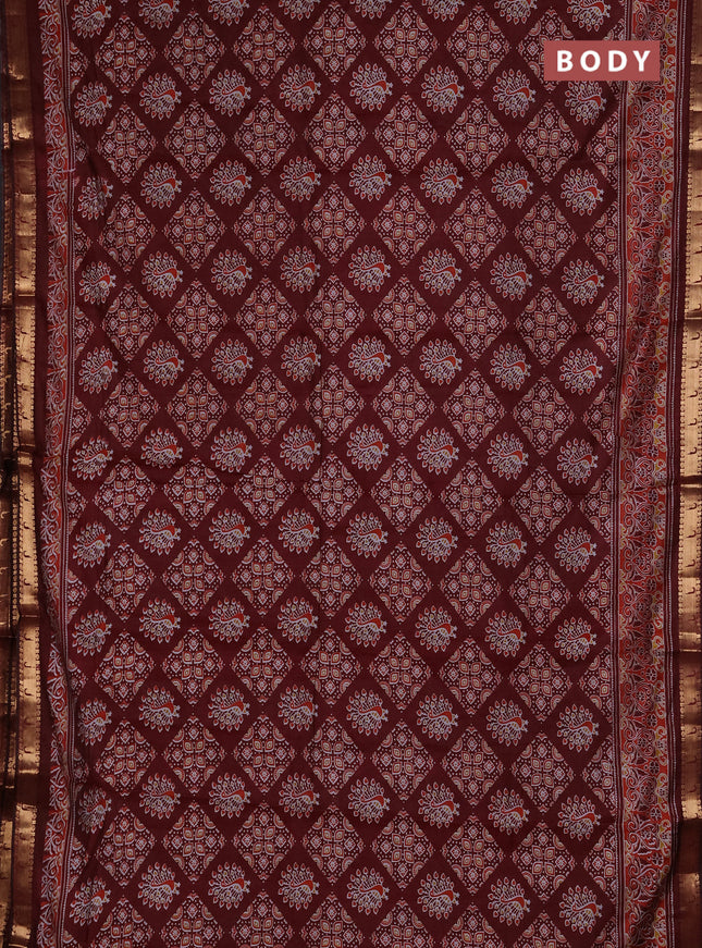Semi maheshwari cotton saree maroon with allover ajrakh prints and zari woven muniya style border