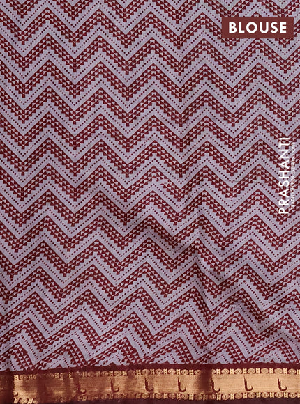 Semi maheshwari cotton saree maroon with allover ajrakh prints and zari woven muniya style border