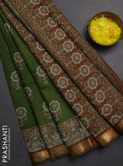Semi maheshwari cotton saree light green with allover floral butta prints and zari woven muniya style border