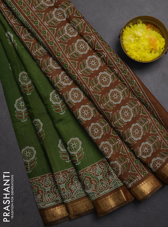 Semi maheshwari cotton saree light green with allover floral butta prints and zari woven muniya style border