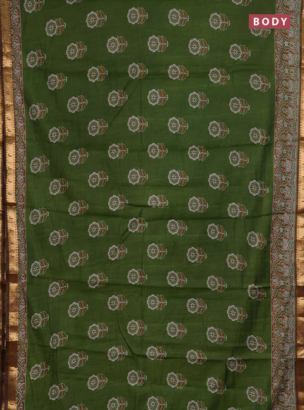 Semi maheshwari cotton saree light green with allover floral butta prints and zari woven muniya style border