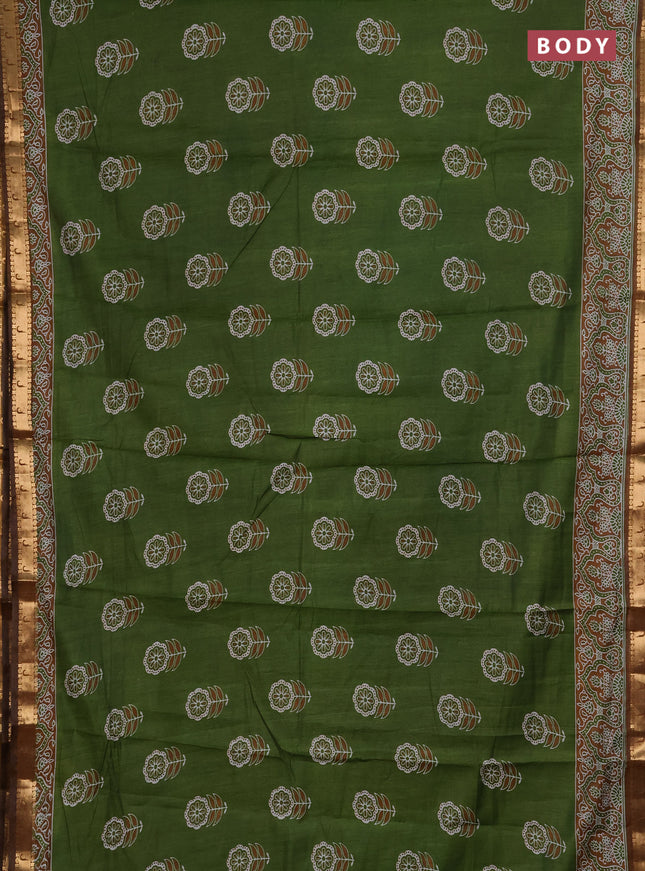 Semi maheshwari cotton saree light green with allover floral butta prints and zari woven muniya style border
