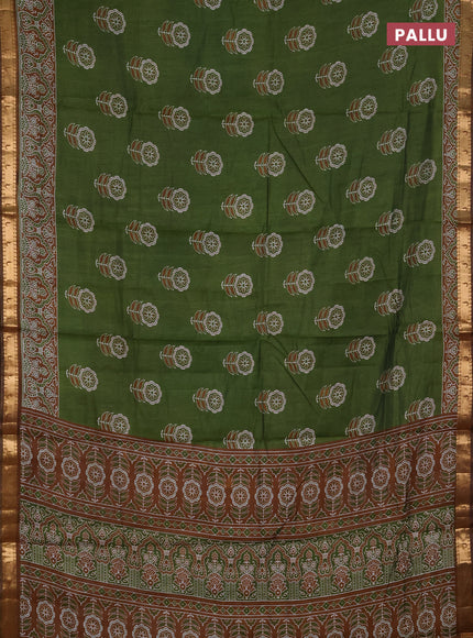 Semi maheshwari cotton saree light green with allover floral butta prints and zari woven muniya style border