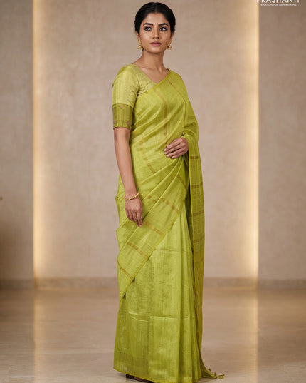 Matka silk saree lime green with allover coin buttas in borderless style