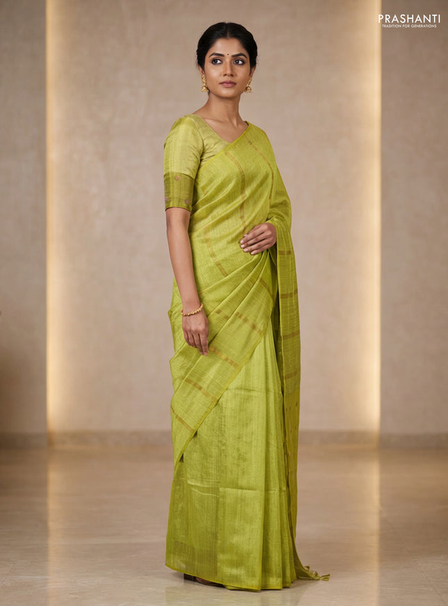 Matka silk saree lime green with allover coin buttas in borderless style