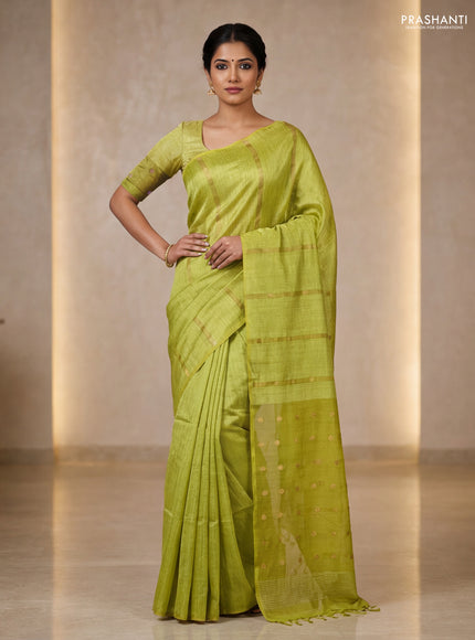 Matka silk saree lime green with allover coin buttas in borderless style