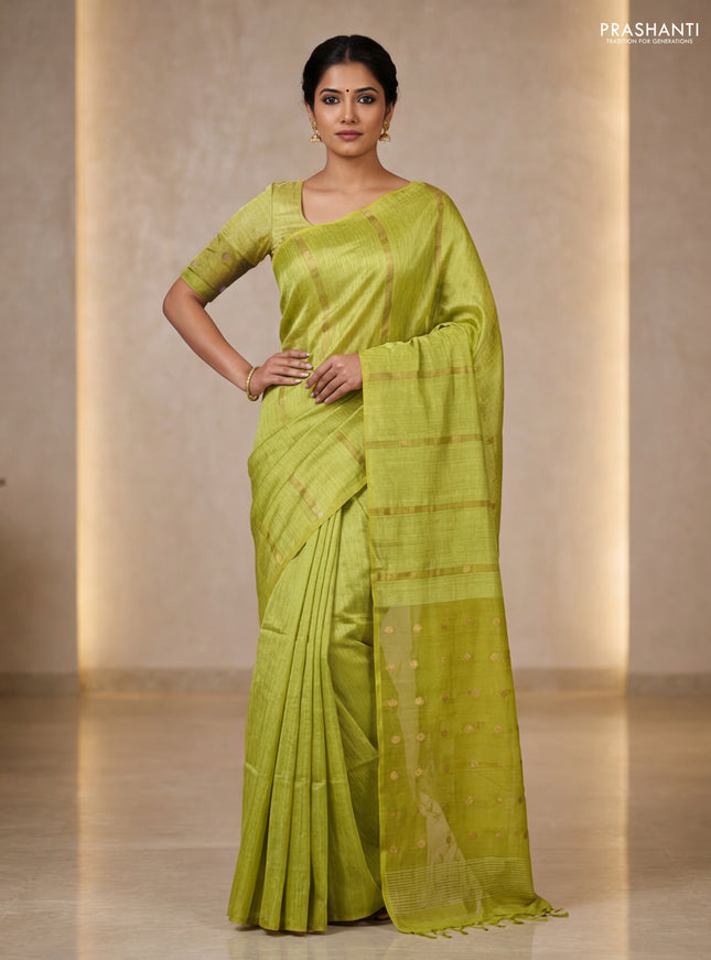 Matka silk saree lime green with allover coin buttas in borderless style