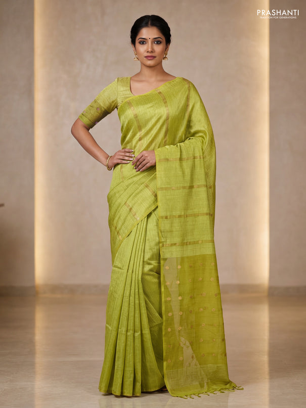 Matka silk saree lime green with allover coin buttas in borderless style
