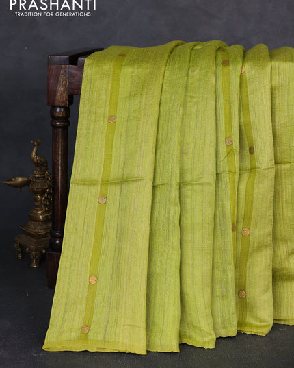 Matka silk saree lime green with allover coin buttas in borderless style
