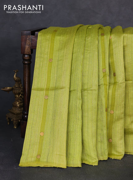 Matka silk saree lime green with allover coin buttas in borderless style