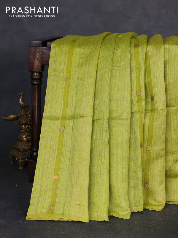 Matka silk saree lime green with allover coin buttas in borderless style