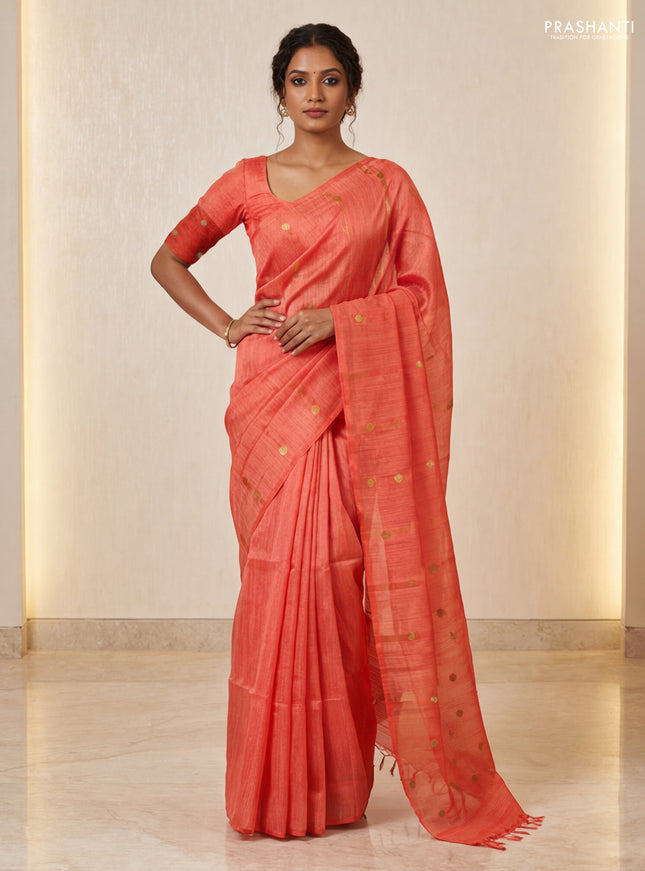 Matka silk saree orange with allover coin buttas in borderless style