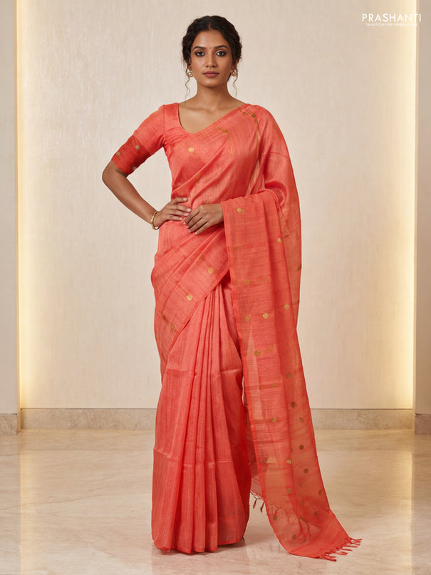 Matka silk saree orange with allover coin buttas in borderless style