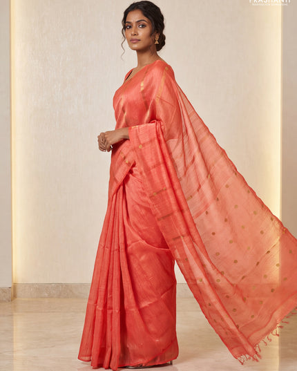 Matka silk saree orange with allover coin buttas in borderless style