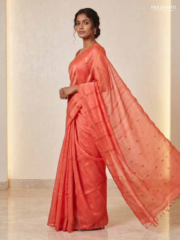 Matka silk saree orange with allover coin buttas in borderless style