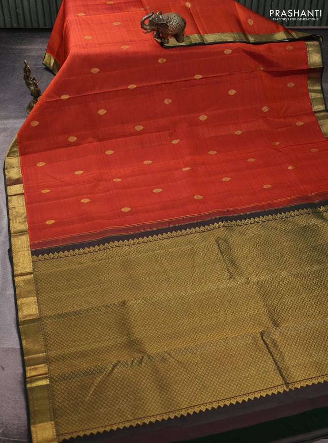 Pure kanchipuram silk saree rustic orange and bottle green with zari woven buttas and zari woven border