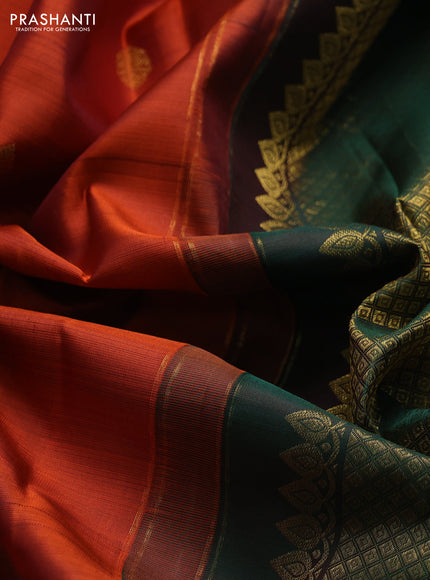 Pure kanchipuram silk saree rustic orange and bottle green with zari woven buttas and zari woven border