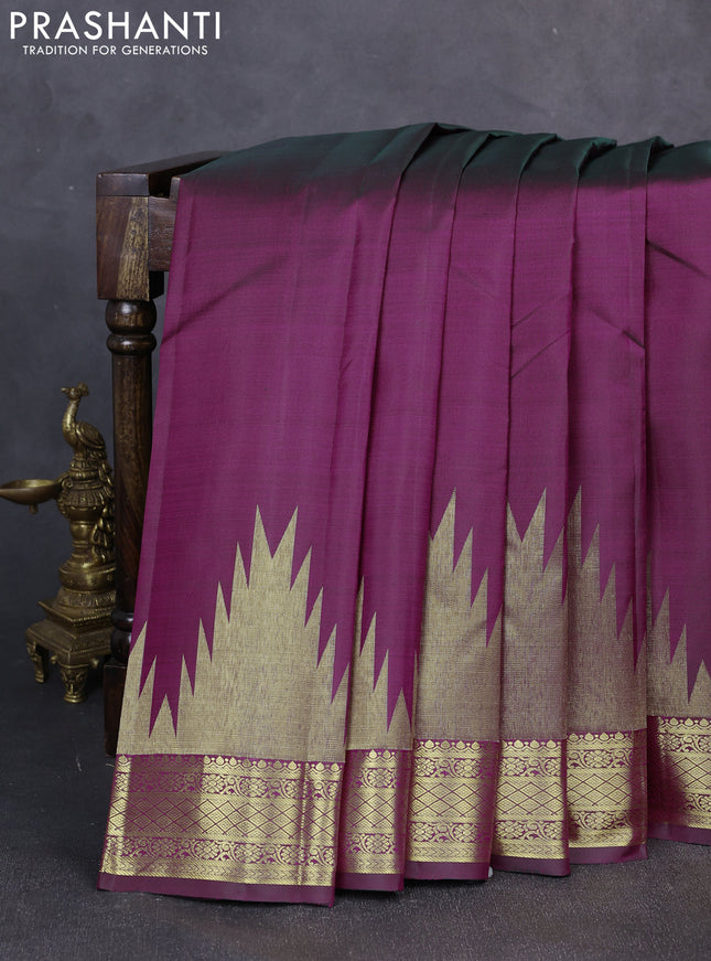 Pure kanchipuram silk saree deep wine shade with plain body and temple zari woven border