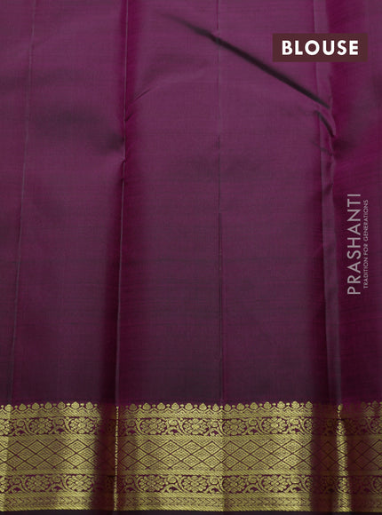 Pure kanchipuram silk saree deep wine shade with plain body and temple zari woven border