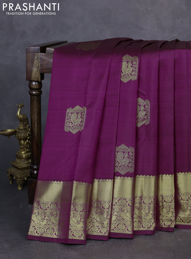Pure kanchipuram silk saree wine shade with zari woven buttas and zari woven border