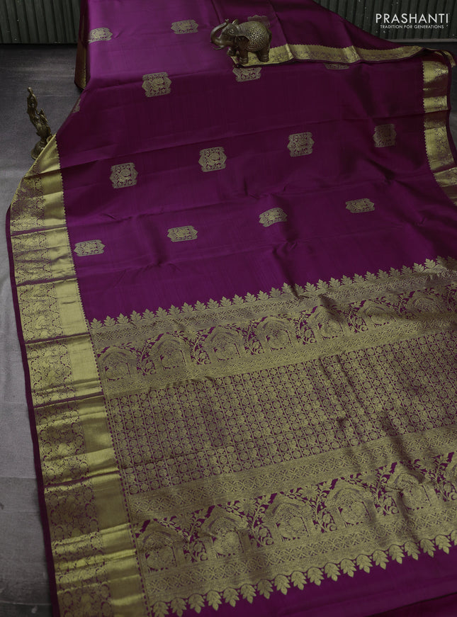 Pure kanchipuram silk saree wine shade with zari woven buttas and zari woven border