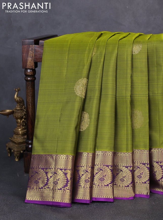 Pure kanchipuram silk saree light green and violet with zari woven buttas and zari woven border