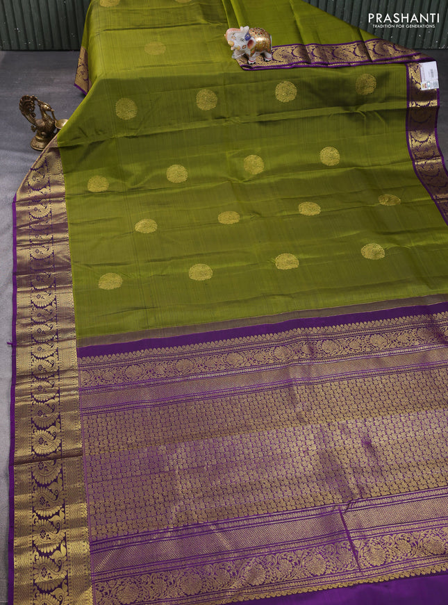 Pure kanchipuram silk saree light green and violet with zari woven buttas and zari woven border