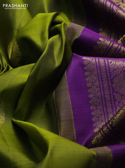 Pure kanchipuram silk saree light green and violet with zari woven buttas and zari woven border