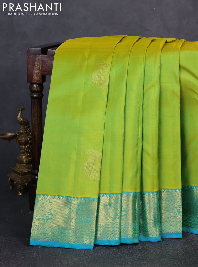 Pure kanchipuram silk saree light green and cs blue with zari woven buttas and zari woven border