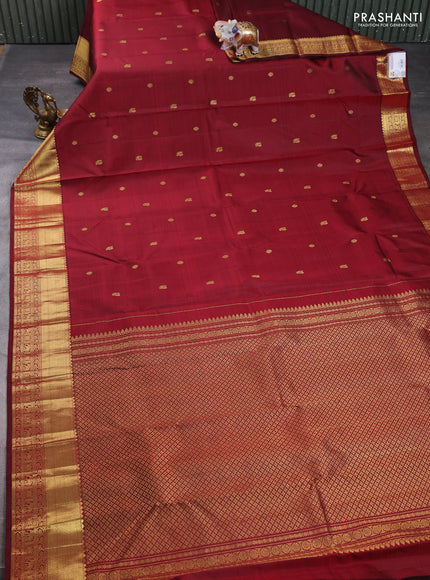 Pure kanchipuram silk saree deep maroon with zari woven buttas and zari woven border