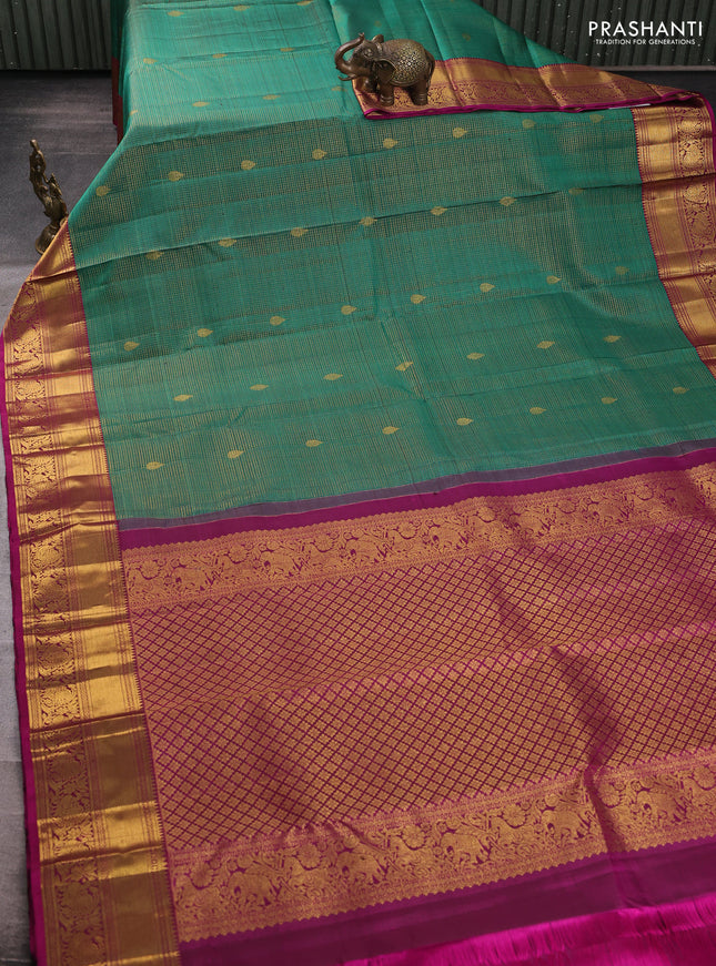 Pure kanchipuram silk saree green and magenta pink with allover zari small checks & buttas and zari woven border