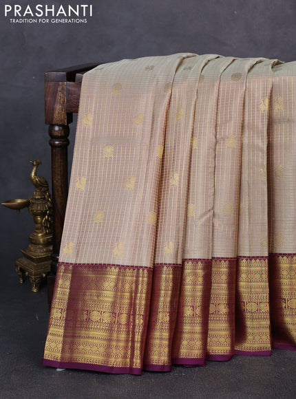Pure kanchipuram silk saree beige and deep wine with allover zari small checks & buttas and zari woven border