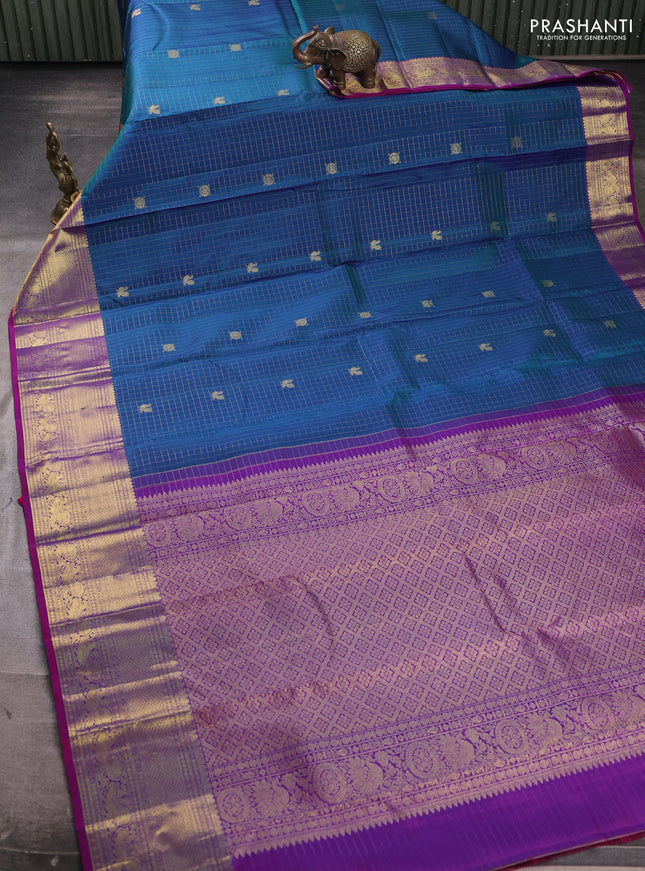 Pure kanchipuram silk saree dual shade of bluish green and pink with allover zari small checks & buttas and zari woven border