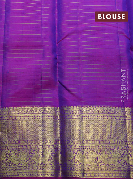 Pure kanchipuram silk saree dual shade of bluish green and pink with allover zari small checks & buttas and zari woven border