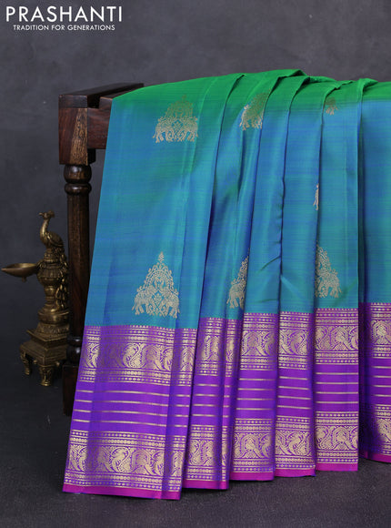 Pure kanchipuram silk saree dual shade of bluish green and purple with zari woven buttas and long zari woven border